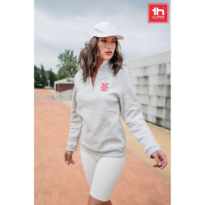 Woman in casual sportswear outdoors.