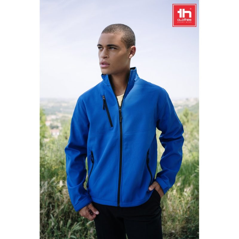 Man wearing blue jacket outdoors