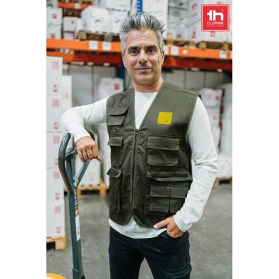 Man wearing safety vest in warehouse