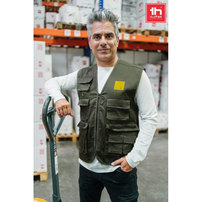 Man wearing safety vest in warehouse