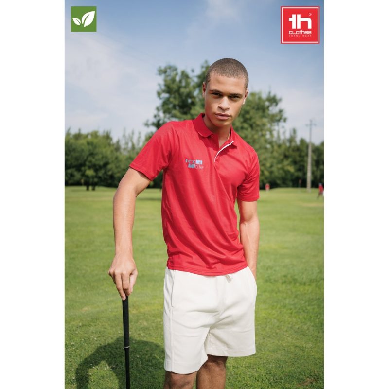 Man in red polo shirt on golf course