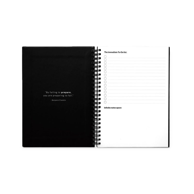 Open planner with motivational quote and to-do list.