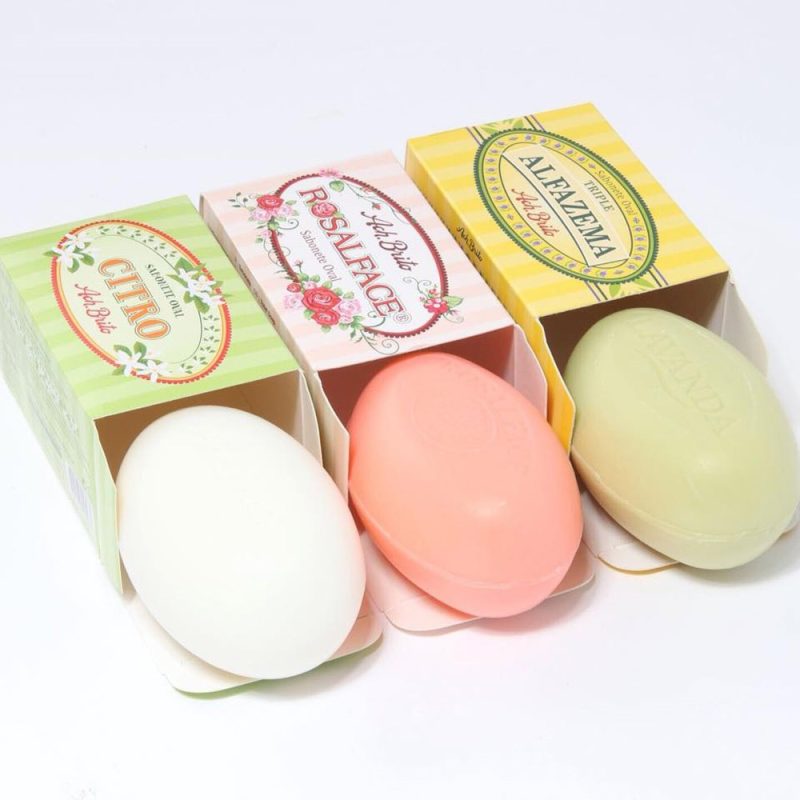 Three assorted scented soap bars in boxes.