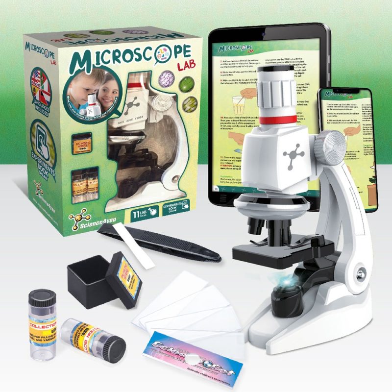 Microscope lab kit with accessories and instructions.