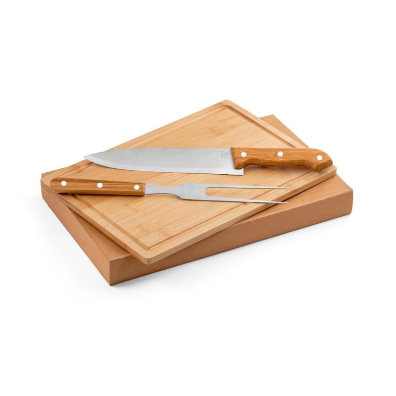 Wooden chopping board with knife and fork set.