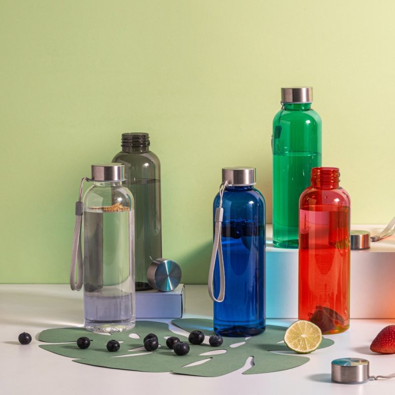 Colourful reusable bottles with fruit on display.