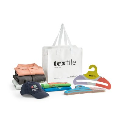 Textile showcase with clothes, cap, bag, hangers.