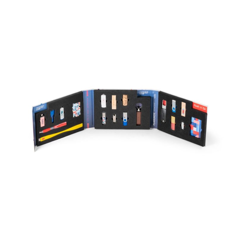 Variety of USB drives in display case.