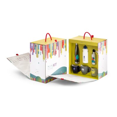 Colourful drink kit with bottles and mugs.