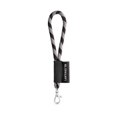 Striped lanyard with clip and black label attachment.