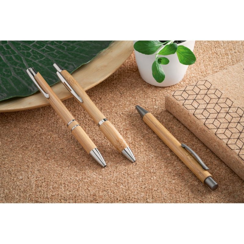 Eco-friendly bamboo pens with cork notebook.