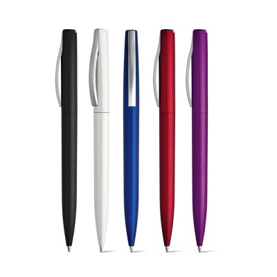 Five colourful ballpoint pens on white background.