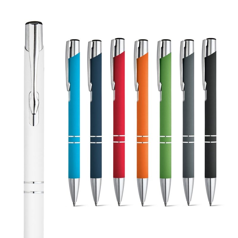 Colourful retractable ballpoint pens aligned in a row.