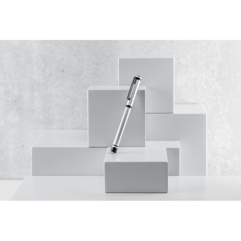 Elegant pen on geometric white blocks display