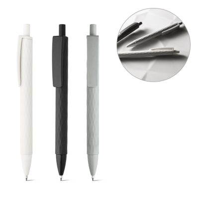 Three ballpoint pens with textured grip.