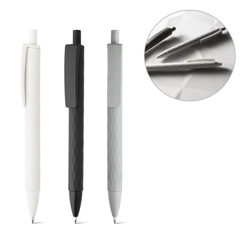 Three ballpoint pens with textured grip.