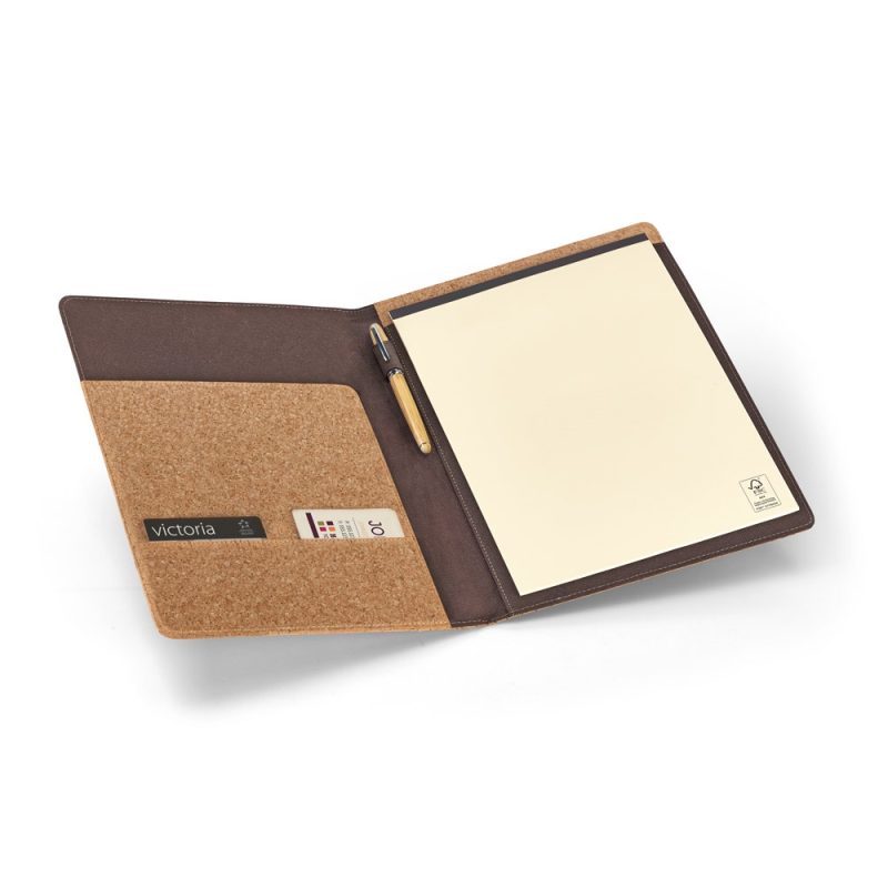 Open notebook with cork cover and pen holder.