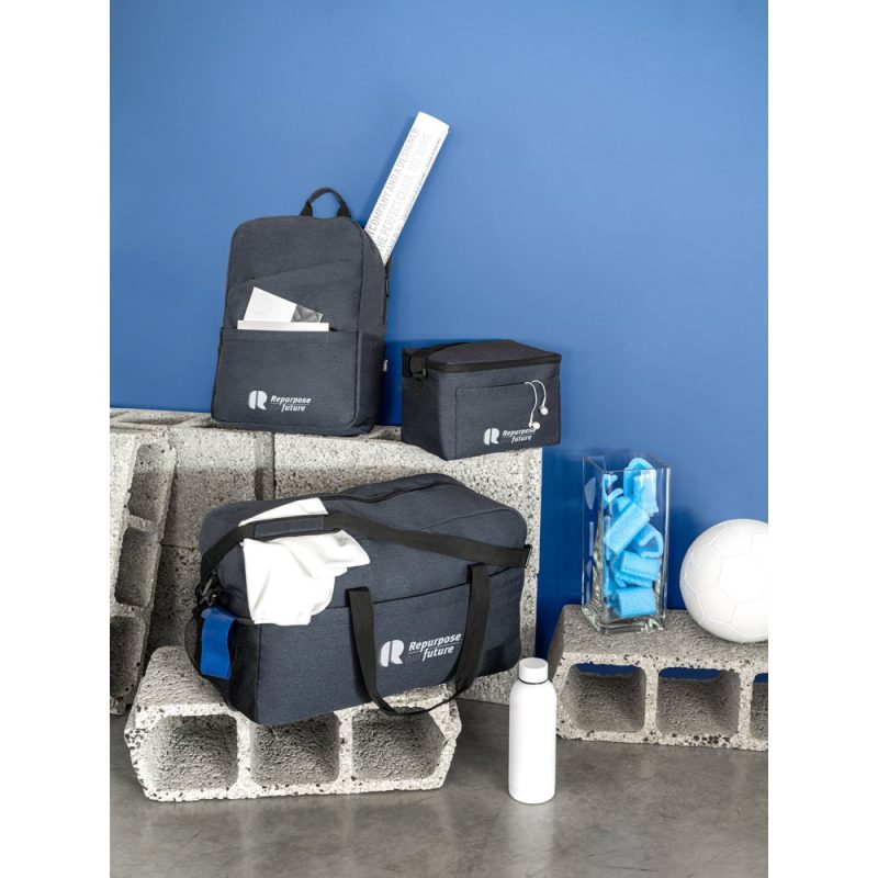 Eco-friendly bags on concrete blocks, blue background.