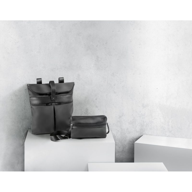 Black backpack and pouch on display