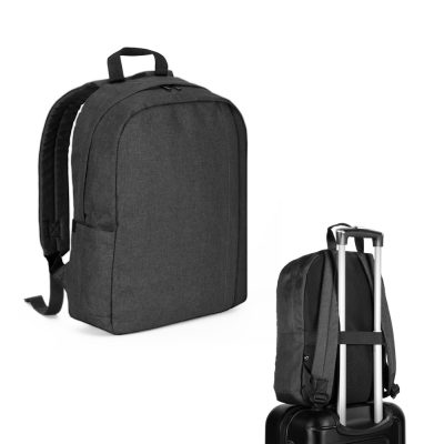 Black backpack with trolley strap on suitcase.