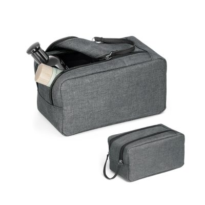 Grey toiletry bags with travel bottles inside.