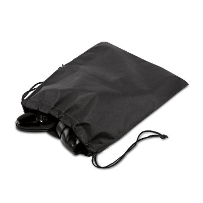 Black drawstring bag partially covers shoes