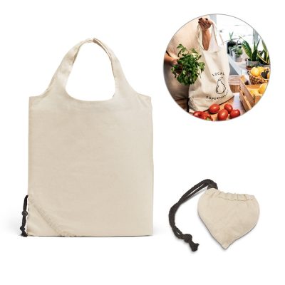 Reusable canvas grocery bag with drawstring pouch.