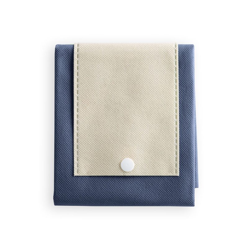Folded blue and beige fabric with button