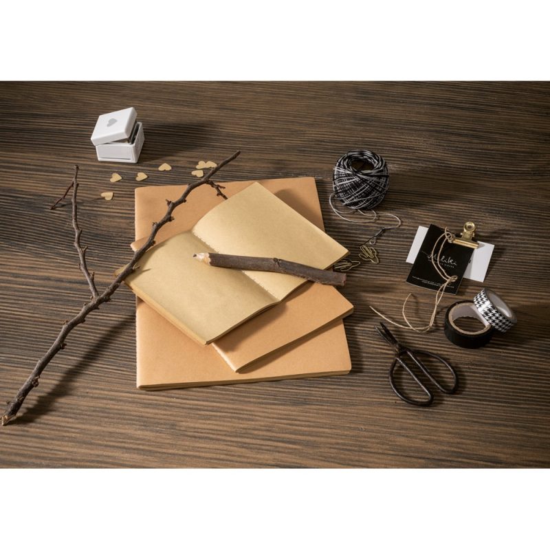 Vintage stationery set with notebooks and accessories.