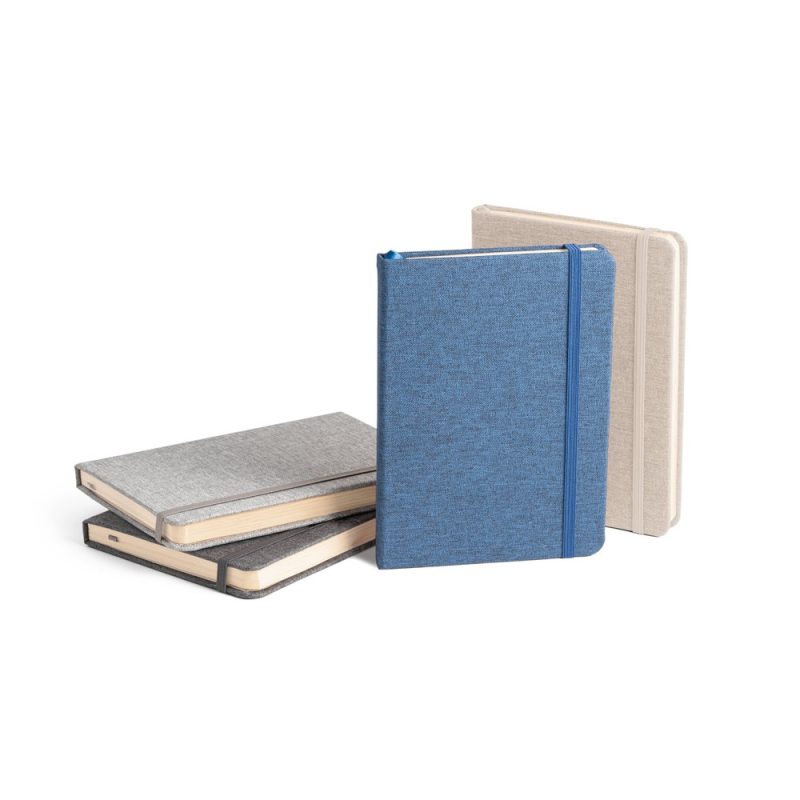 Assorted hardcover notebooks with textured covers.