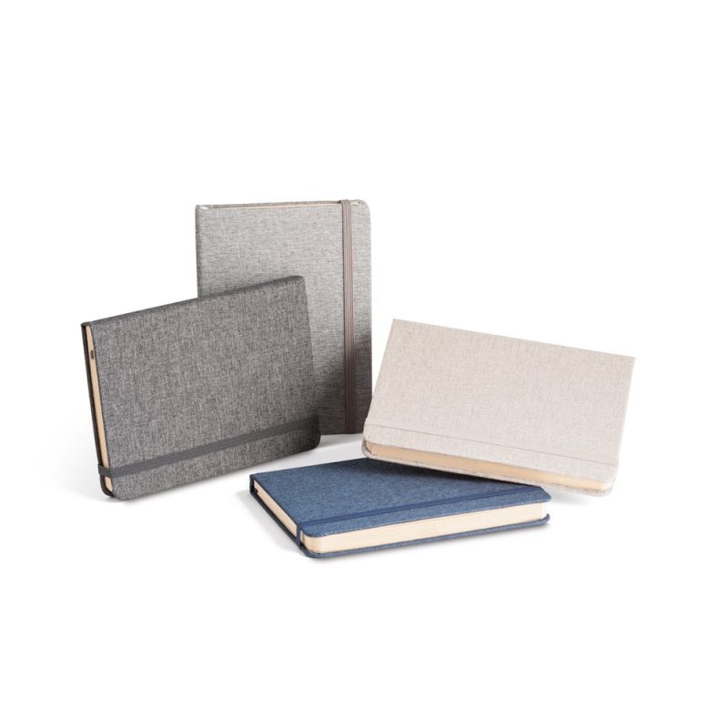 Four fabric-covered notebooks in different colours.