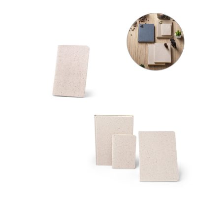Set of blank textured notebooks on table.