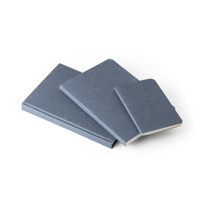Three blue notebooks of different sizes.