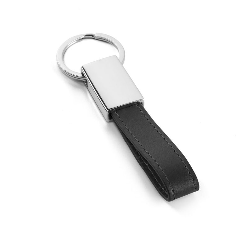 Black leather and metal keyring on white background.