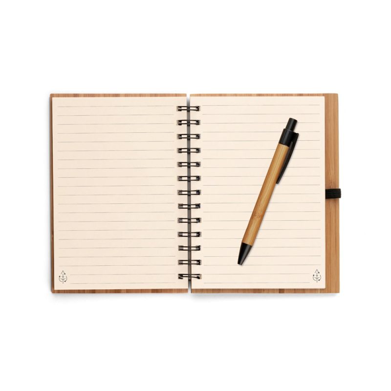 Open notebook with pen on paper