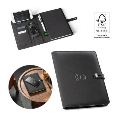 Black notebook with phone charging capabilities.