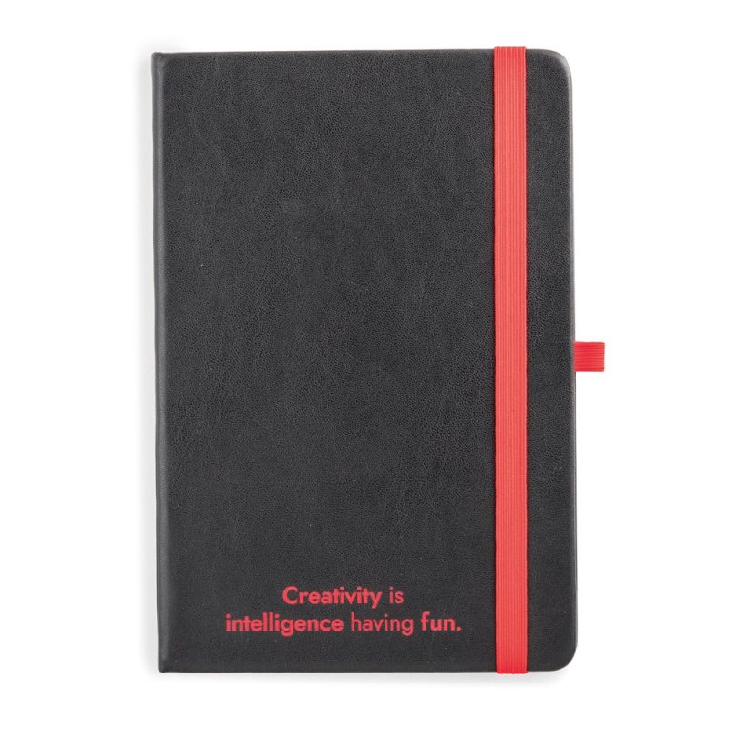 Black notebook with red strap and quote.