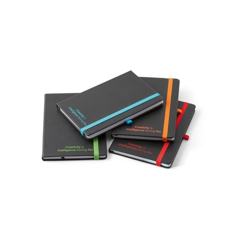 Colourful notebooks with motivational text on covers.