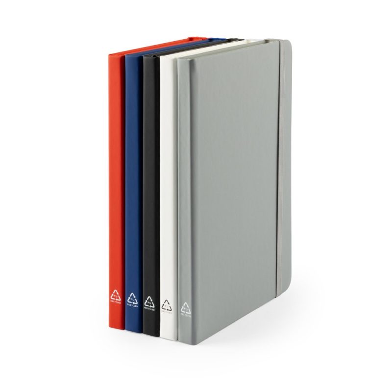 Colourful notebooks standing upright in a row.