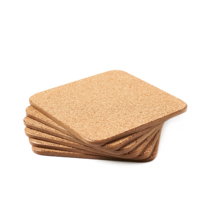 Stack of brown cork square coasters
