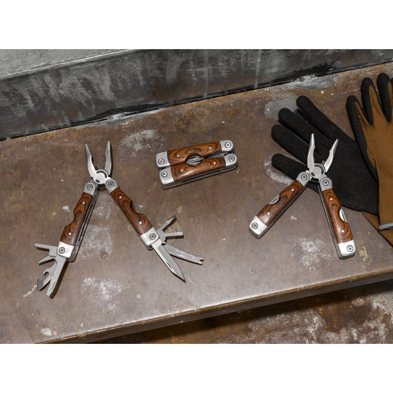 Wood-handle multi-tools on workbench with gloves.