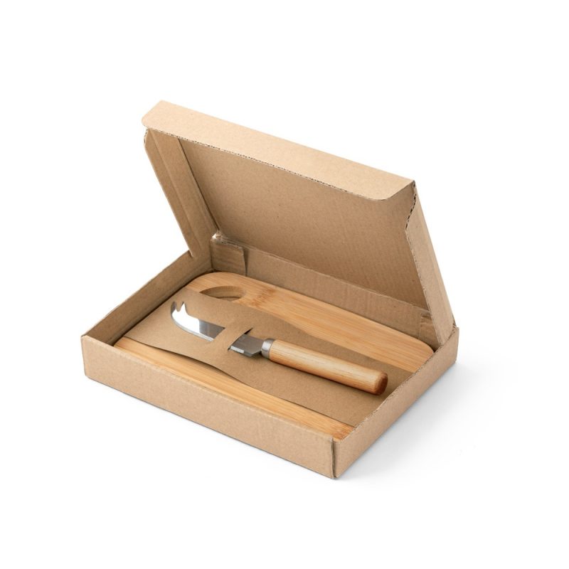 Open cardboard box with knife and cutting board