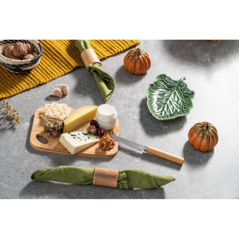 Autumn cheese platter with pumpkins and nuts.