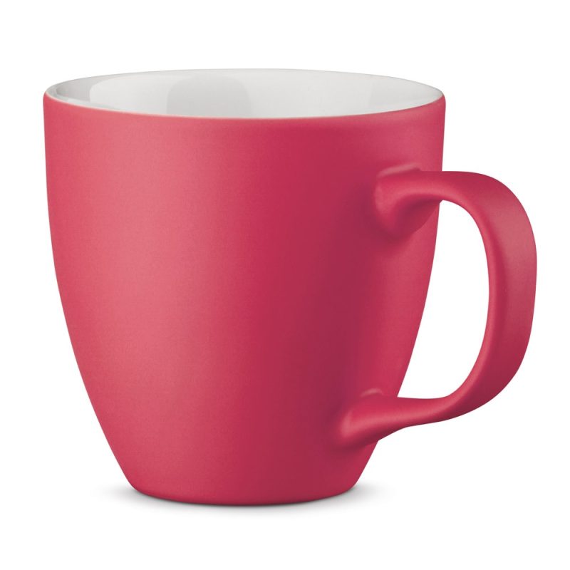 Bright red ceramic coffee mug on white background.
