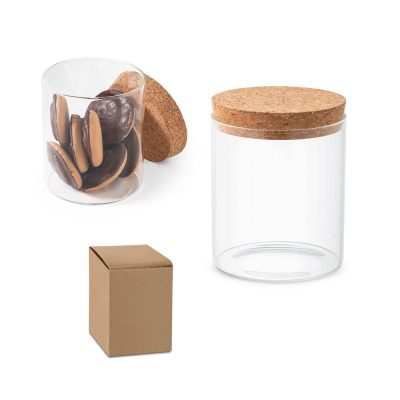 Glass jars with cork lids, one containing biscuits.