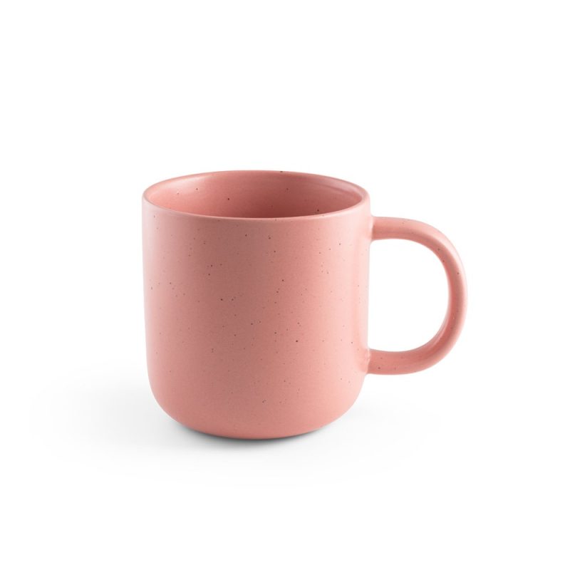 Pink ceramic mug on white background.