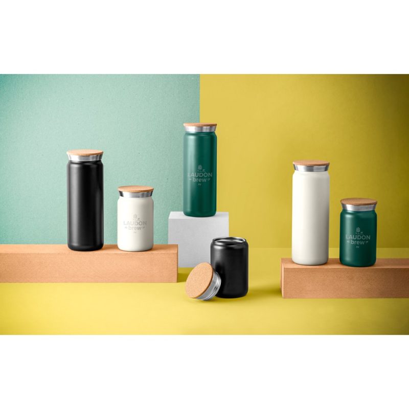 Assorted reusable bottles on colourful background.