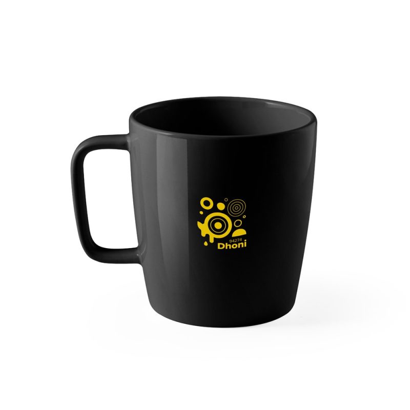 Black mug with yellow abstract design