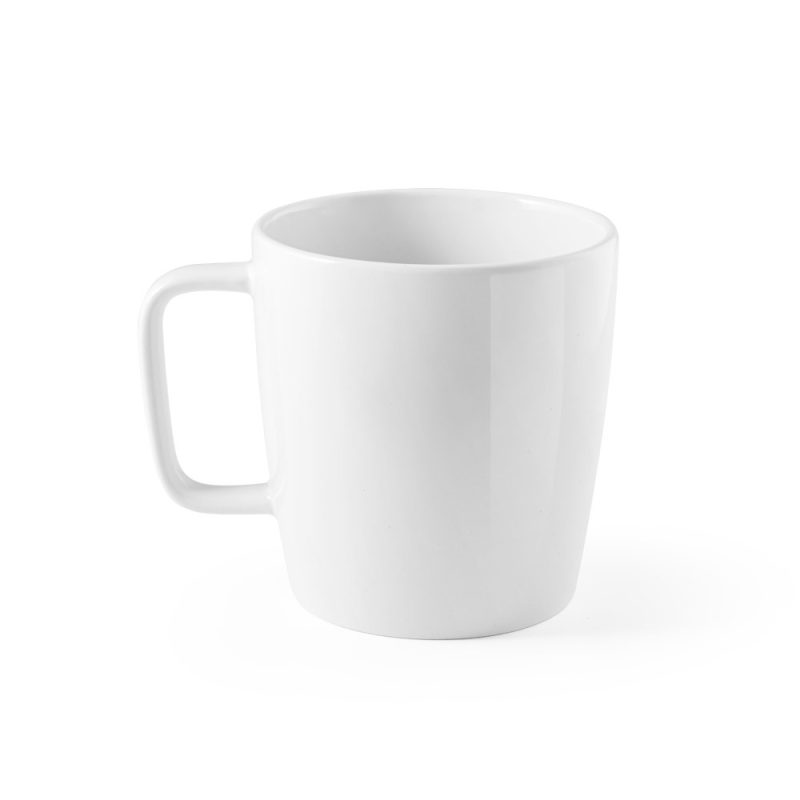 White ceramic mug on a plain background