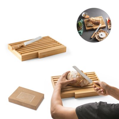 Bamboo bread board with knife and bread, sliced.